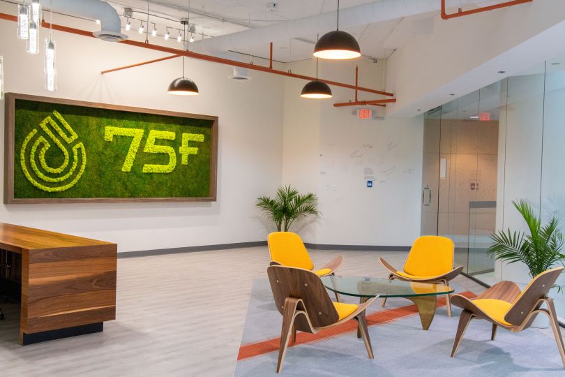 75F office front entrance with branded logo on wall